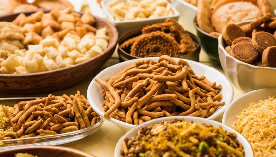 Trays of Indian sweets and savoury snacks